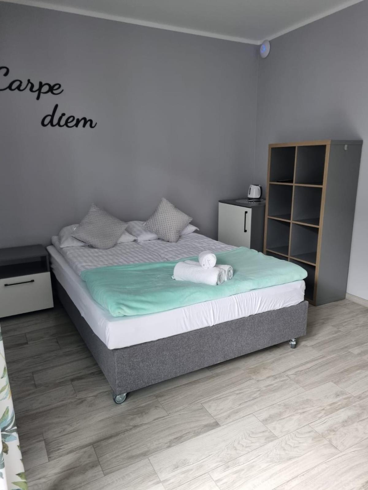 Carpe Diem Pokoje Goscinne Łeba Habitación foto